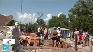 ريبورتاج: لنصلح معا حملة من أجل إعادة بناء المنازل المتضررة جراء الحرب في أوكرانيا • فرانس 24