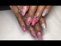 Pink coffin/ballerina nails with real flowers