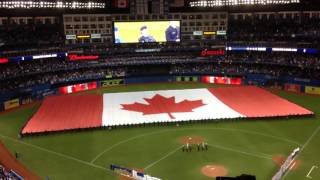 A massive canadian flag is unfurled during the singing of o canada as
toronto blue jays host their first playoff game in 22 years! check out
explorerepea...