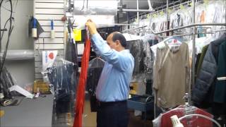 Ironing clothes at Tailor & Dry Cleaners in Yonkers, NY