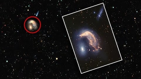 Zoom into interacting galaxies Arp 142