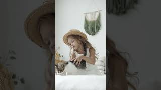 Girl Sitting On Bed With A Cat