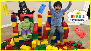 GIANT LEGO BUILDING CHALLENGE FOR KIDS with Ryan ToysReview! Then the lego batman and Lego Batgirl superhero in real 