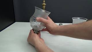 installing and removing glass shades on vintage wall sconce