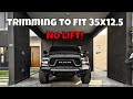 Ram 1500 Rebel 20x12 wheels on 35 inch mud tires no lift kit