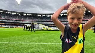 Running onto the MCG with the Richmond Tigers AFL Club