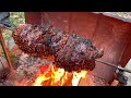 Cooking with fire beef top round on a 30 year old homemade rotisserie