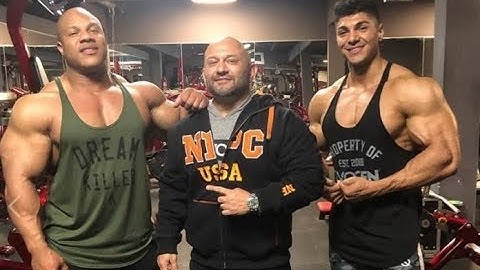 Phil Heath and Andrei Deiu with a FST 7 Arm workout at FIBO