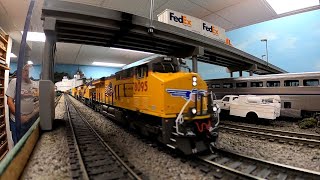 MYCPB trip across the UPSF HO Scale Layout
A little trackside and drone footage on the HO Scale UPSF Joint Line. Tonight we chased Union Pacific train MYCPB on a re-route over the line.
Locations include (in order of appearance) : a river crossing, Charles Interlocking, Frisco, the west end of Starr Siding, back at Charles Interlocking, and finally on the #1 main at the east end of Argentine Yard.
22 cars and 3 Intermountain GE locomotives. MYCPB trip across the UPSF HO Scale Layout