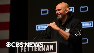 Democrats stave off "red wave" in midterm elections