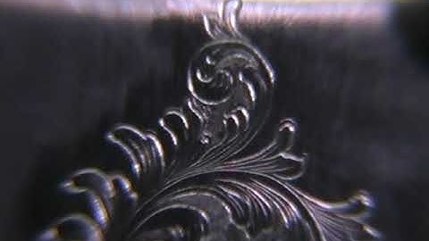 Hand engraved Stainless Steel English open Scrollwork Money clip by Shaun Hughes