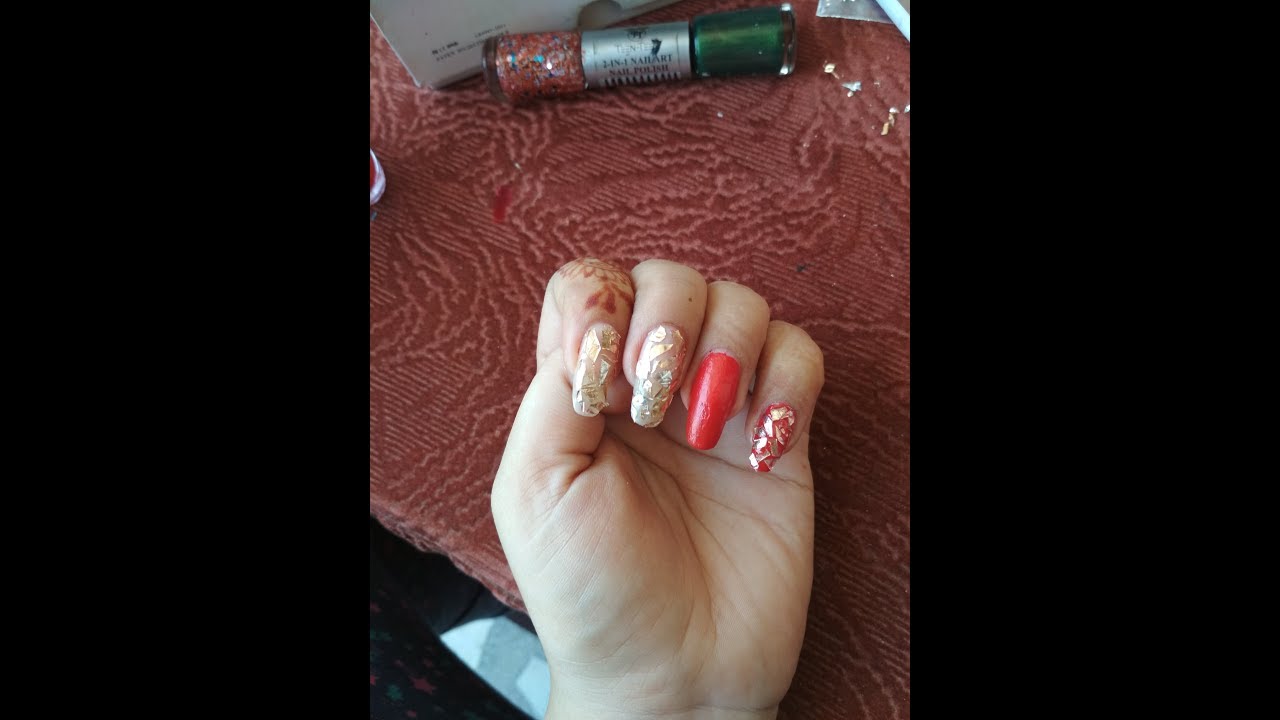 Red Nail art design with Mylar