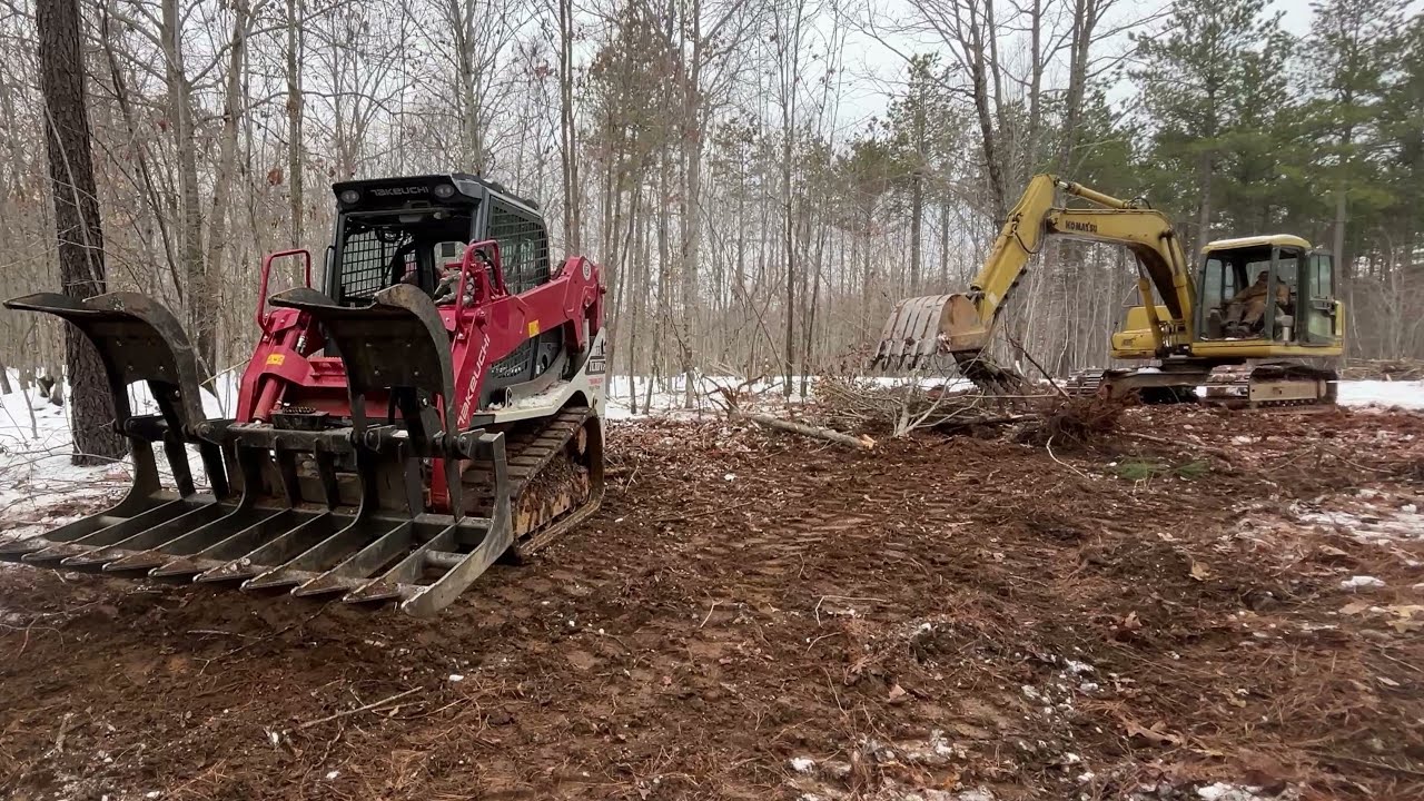 Takeuchi TL10 and Grapple Attachment