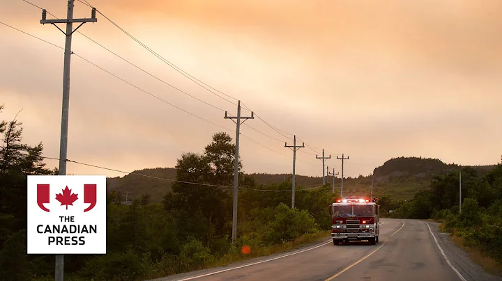 Thousands preparing to flee as fire roars near Newfoundland capital
