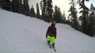 Ryan skiing down a bumpy black trail at Northstar backside