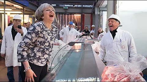 Theresa May heckled at London's Smithfield Market