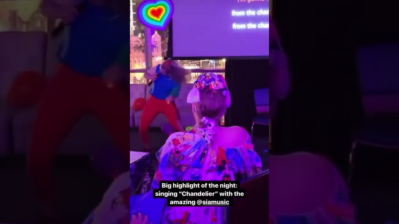 Sia sings Chandelier live at karaoke .