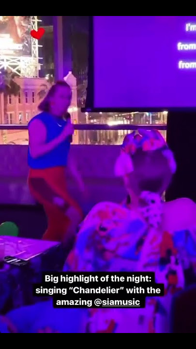 Sia sings Chandelier live at karaoke .