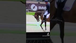 Dressage Rider Andrew Gould's horse exits the Grand Prix Dressage Test with it's head down.