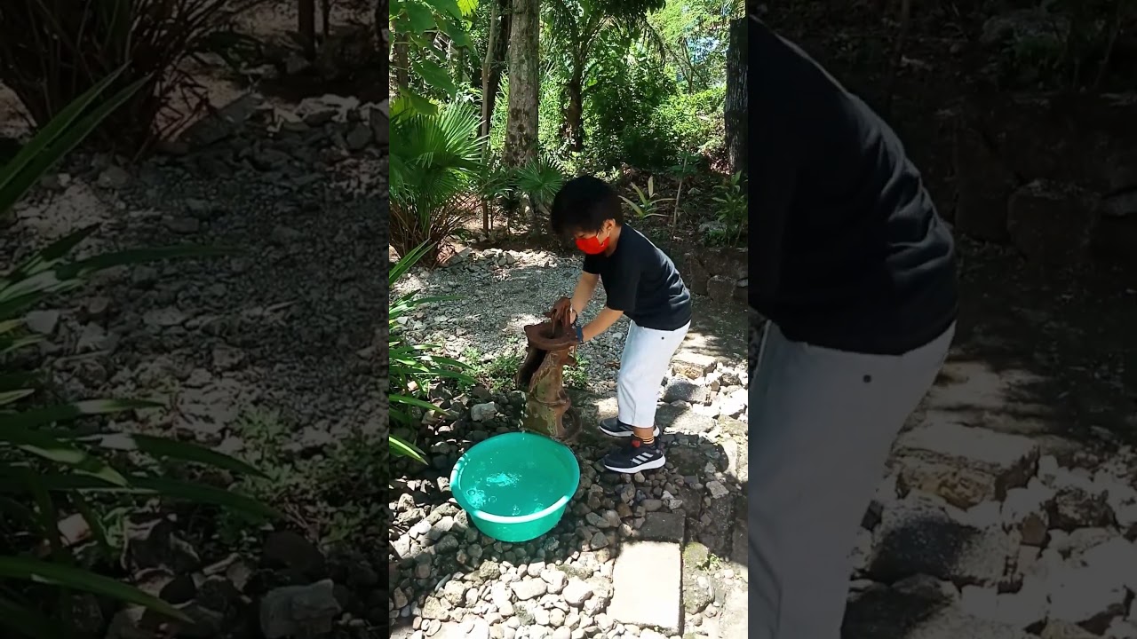 pag-iigib ng tubig sa poso