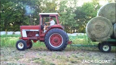 Unloading (Dumping) Round Bales of Hay