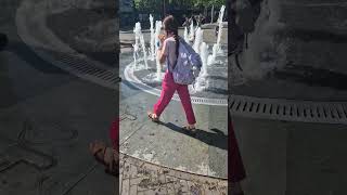 Dog Gets Overexcited by Fountain Water, Jumping, and Playing Energetically