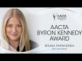 Simon baker presents bruna papandrea the byron kennedy award at 2024 aacta awards