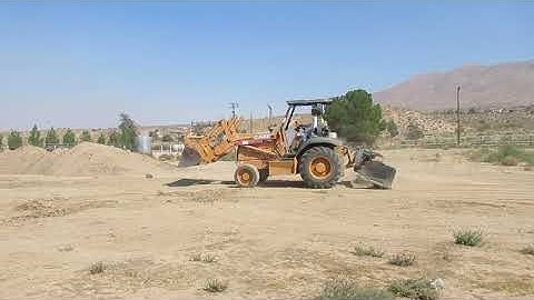 Skip Loader Grader work 1 of 2 by Operator Garrison
