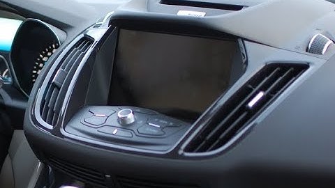How to Remove Radio CD Player from FORD Escape 2013 for Repair.