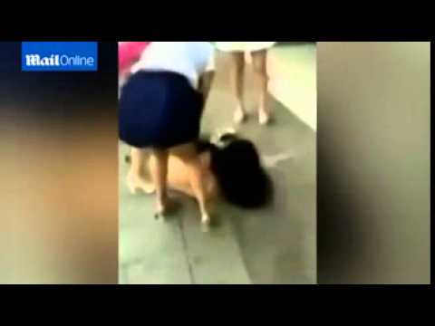 Chinese 'adulteress' is beaten in the...