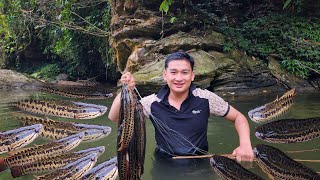 Building furnaces and stream fish traps is the daily life of a small family