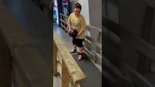 Goofy Kid Shows Off Bowling Skills