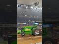 The legendary “Tinker Toy” Pro Stock Tractor roaring down Freedom Hall at the 2026 NFMS Pull!