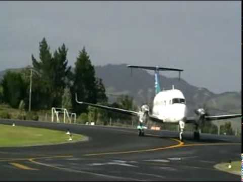 Arrival of Air New Zealand operated Raytheon 1900D aircraft into Whangarei airport from Auckland. June 2009