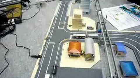 N-scale Faller car system operating many Japanese buses