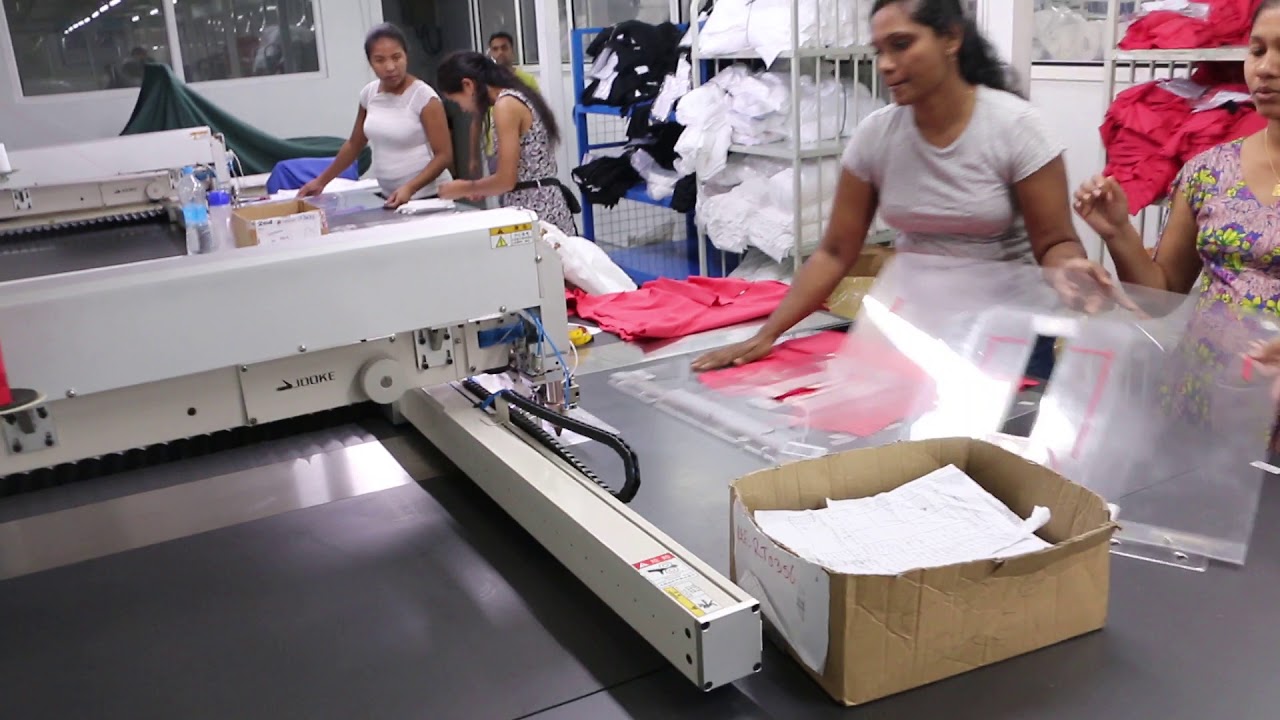 Mauritius AMARI Garment Factory Using Automatic Pattern Sewing Machine Stitching Polo Shirt
