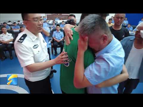 A farmer of Shandong province, East China, reunited with his lost son after 24 years