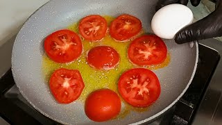 2 tomatoes, 2 eggs..! This quick recipe is great for breakfast! Simple and delicious recipe