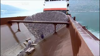 Barge unloading 3800 tons of cobblestone - relaxing video