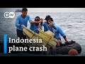 Flight recorders found after Indonesia plane crash | DW News