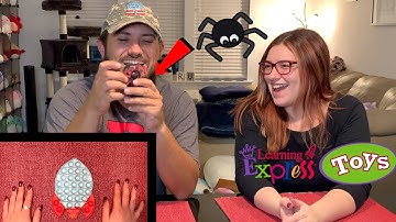 Playing with Fidget Toys and Pop Its from Learning Express!