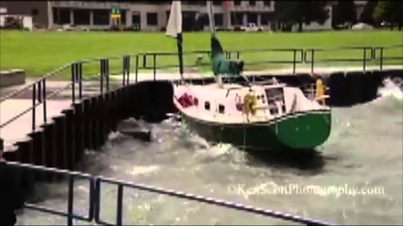 Battered sailboat in West Grand Traverse Bay