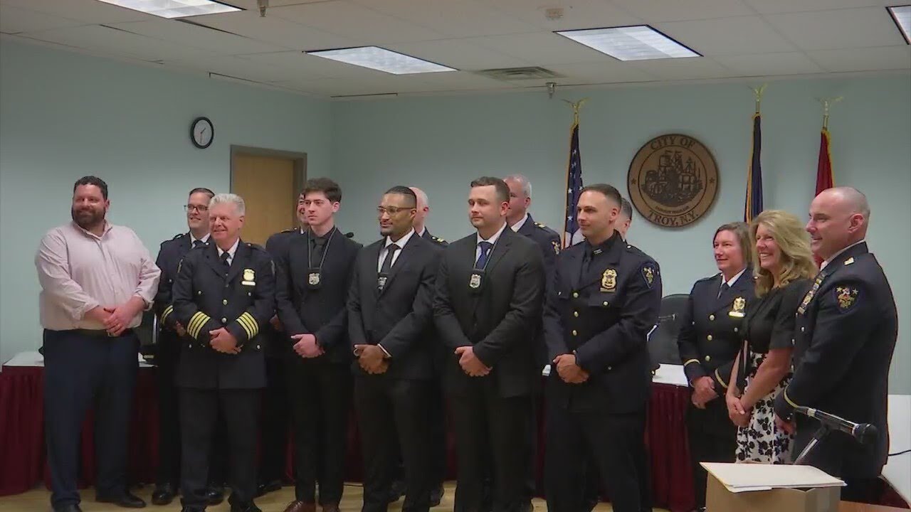 Troy PD swears in four new officers, promotes one - YouTube