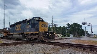 W957 [8857] empty cross tie train headed South/W SD40-2 leading