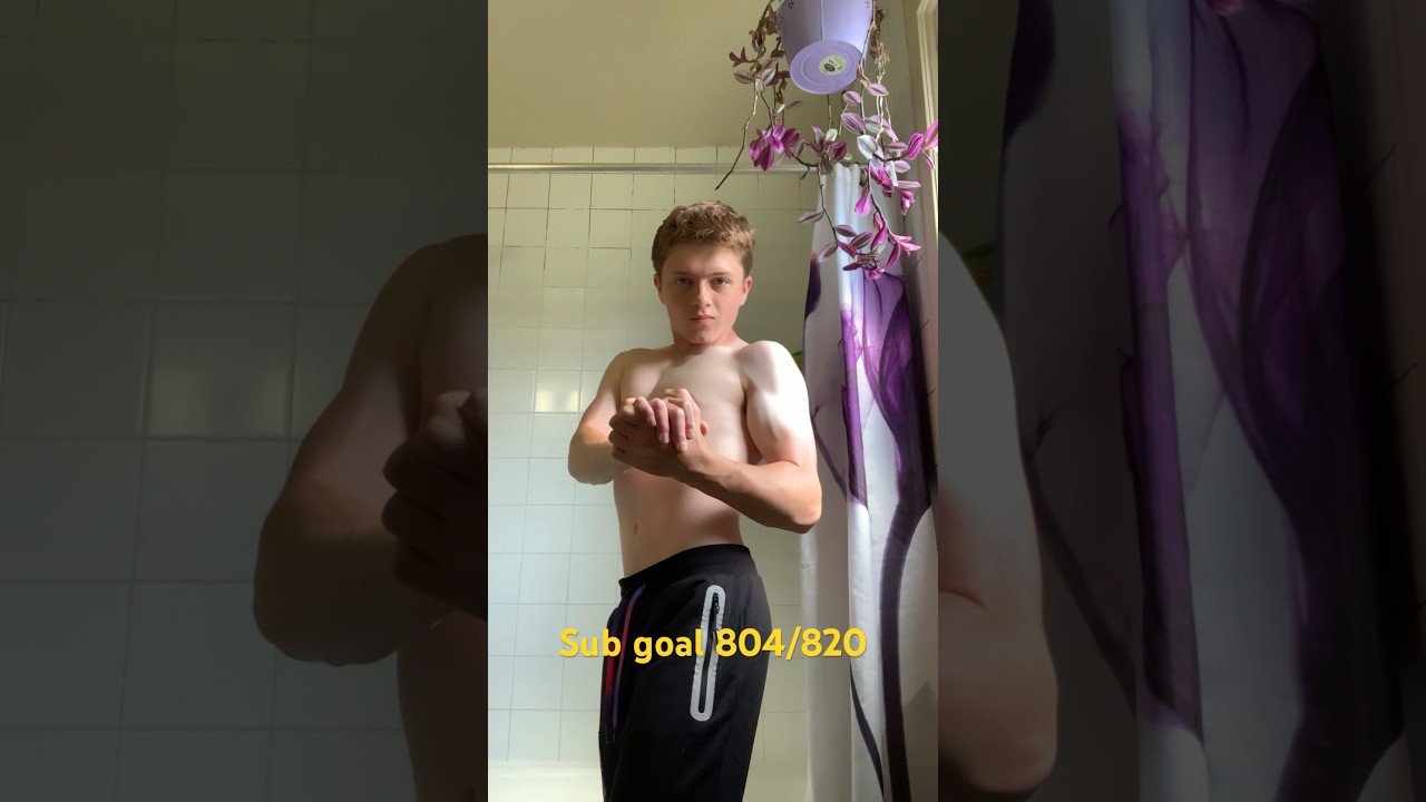 Teen weight lifter flexing his arms 