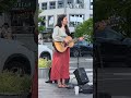 Outside Waterfront near Canada Place Van.B.C. Canada lady performing ncie music.04/25/26