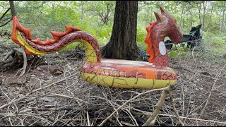 Slaying The Inflatable Dragon By Wrestling It In The Woods Popping On A Pile Of Sticks