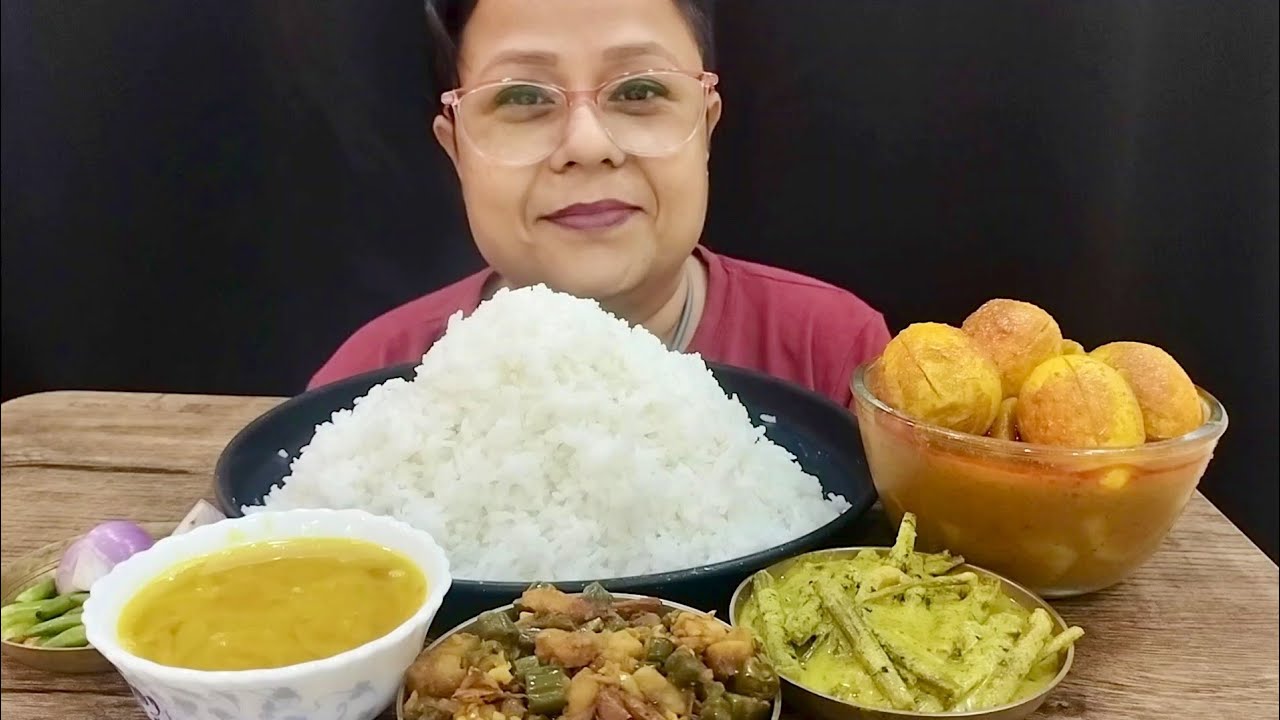 Huge rice, egg curry, daal, chingri shutki, data chorchori 