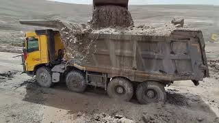 Video Wet Soil Loading From Water Volvo Excavator Machine 480 And Volvo Dumper