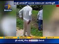 Farmer touches feet of MRO over land issue in Warangal rural district